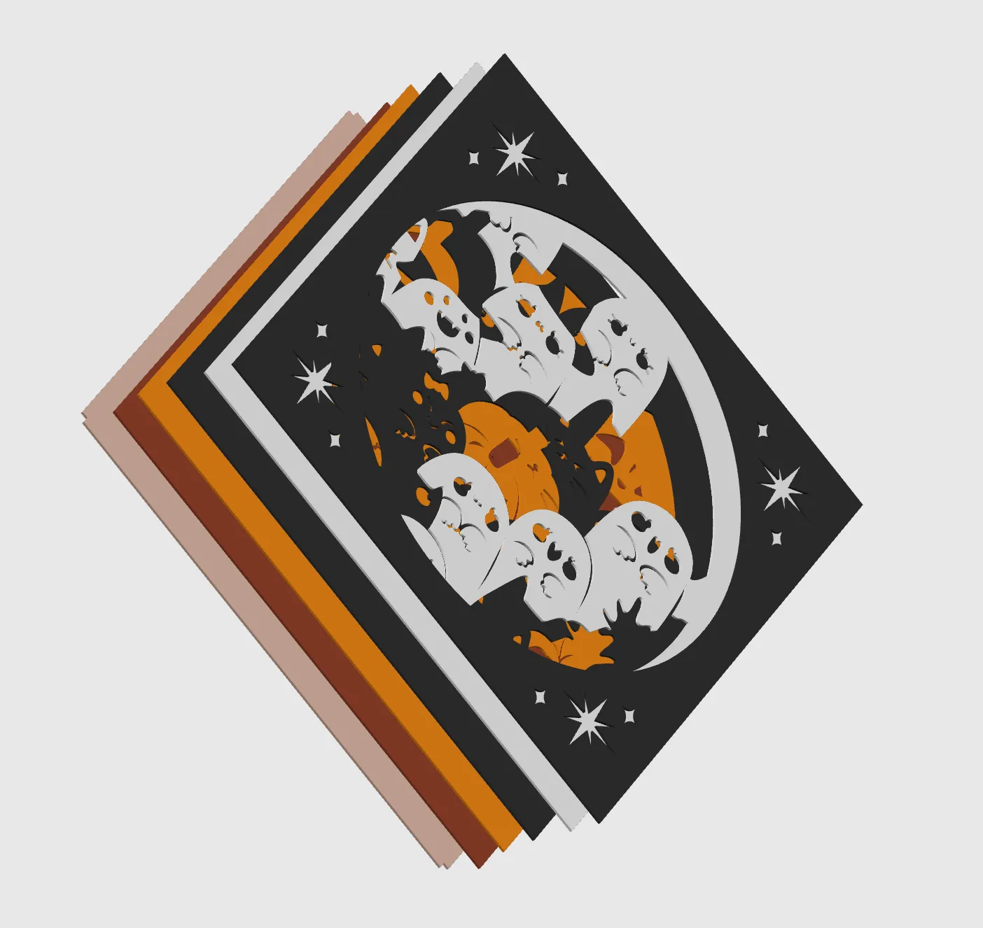 Exploded view of the Halloween piece showing its stacked black, white, orange and brown layers